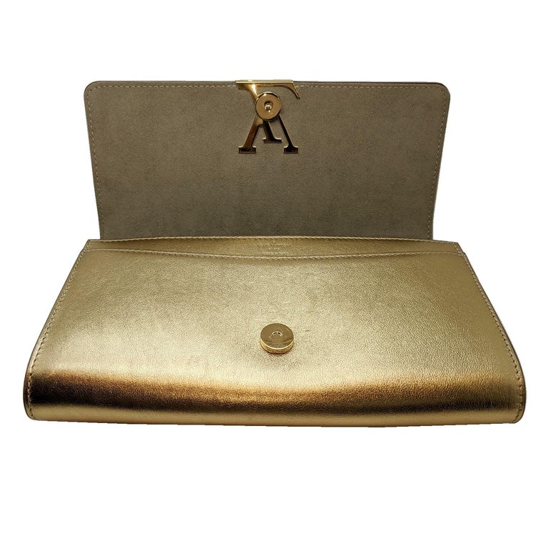 Women's Louis Vuitton Metallic Gold Calfskin Louise E/W Clutch For Sale