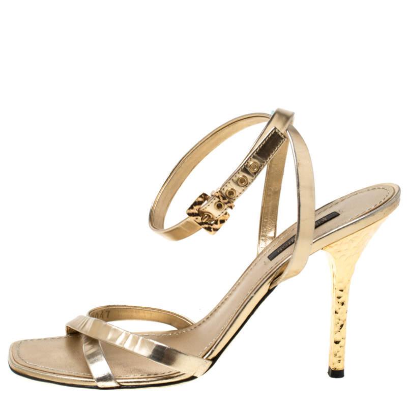 Designed with metallic gold leather straps, these sandals from Louis Vuitton are minimal yet gorgeous. They feature open toes, leather insoles and are elevated on 10.5 cm heels. Show them off in a midi dress and a Chanel flap bag.


