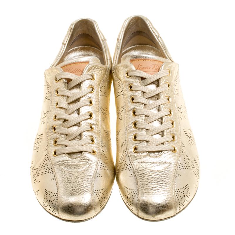 These Louis Vuitton sneakers are simple yet stylish. They've been crafted from metallic gold leather and designed with perforated monogram detailing, laces on the vamps and comfortable insoles. These sneakers are just perfect to ace one's casual