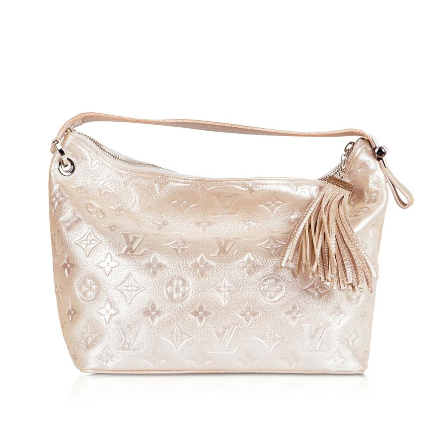 Louis Vuitton limited edition Metallic Monogram Shimmer Halo Bag, made in France, 2008-09.

Date of manufacture: 2008-09
Origin: France
Material: monogram leather, canvas
Hardware: silver-tone
Includes: serial/n, dust bag
Dimensions: H 21 cm x W 25