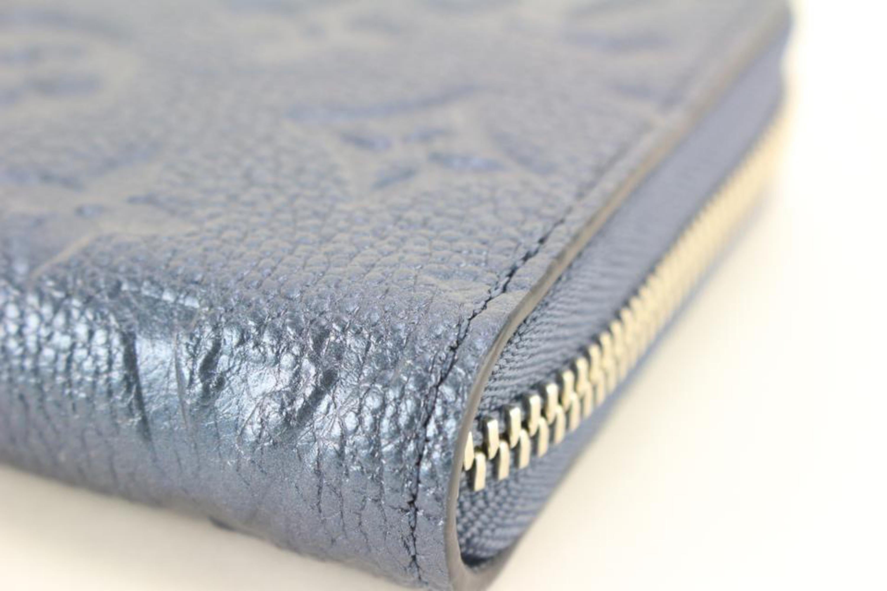 Women's Louis Vuitton Metallic Navy Nacre Empreinte Monogram Zippy Wallet  16lk810s