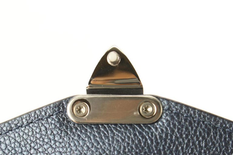 Louis Vuitton Monogram Leather Metallic Navy Nacre Empreinte Key Pouch  58lk725s at 1stDibs
