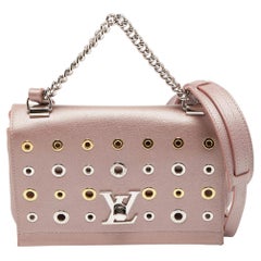 Louis Vuitton - Sac Lockme II en cuir rose métallisé avec œillets