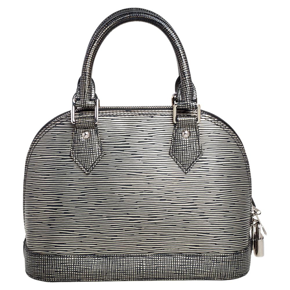 Out of all the irresistible handbags from Louis Vuitton, the Alma is the most structured one. First introduced in 1934 by Gaston-Louis Vuitton, the Alma is a classic that has received love from icons. This piece comes crafted from Epi Leather,