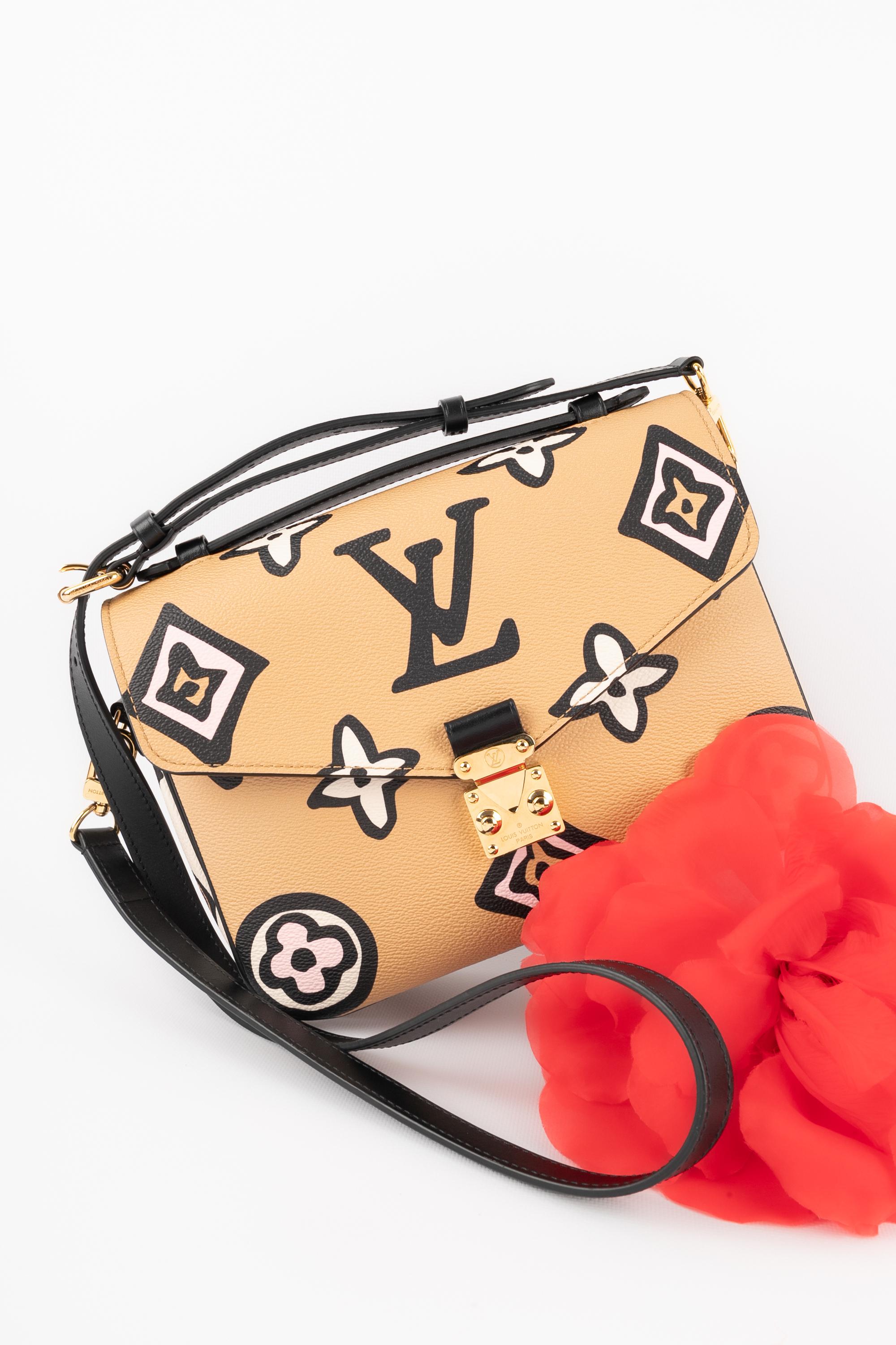 Orange Louis Vuitton Metis handbag