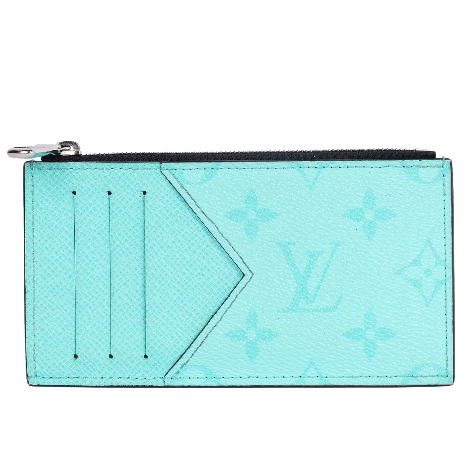Authentic, pre-loved Louis Vuitton Taigarama Coin Card Holder in Miami Green. This thin cardholder features traditional monogram canvas in green with taiga cross-grain leather trim. The cardholder features a rear slip pocket, 4 credit card slots on