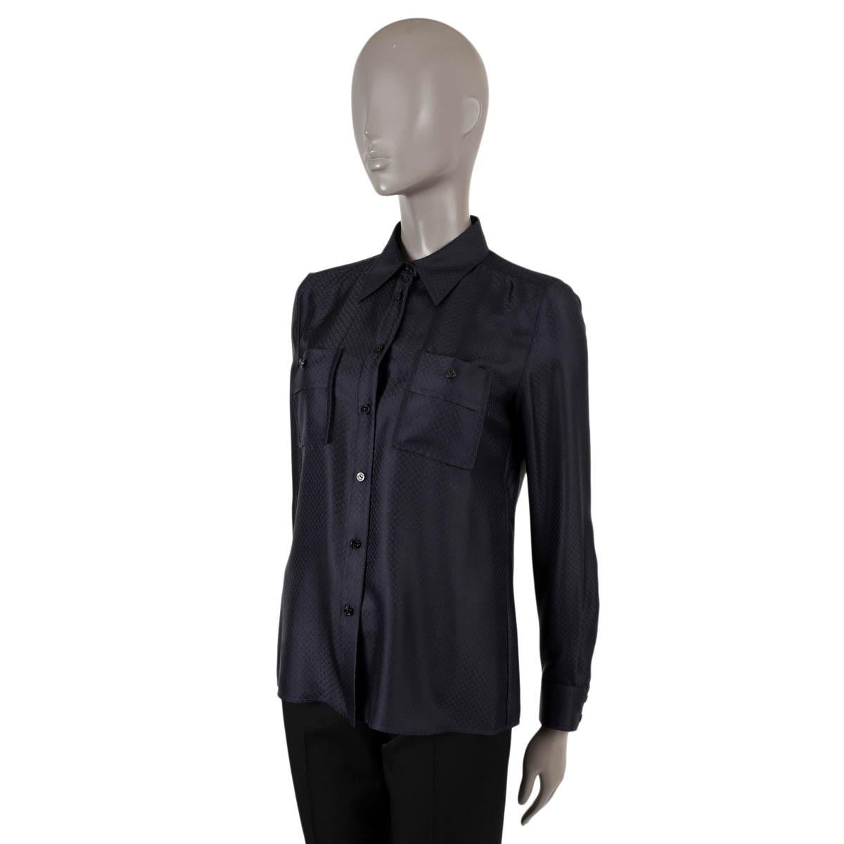 100% authentic Louis Vuitton mini monogram button-up shirt in midnight blue silk (100%). Features two buttoned chest pockets. Brand new with tag.

2020 Pre-Fall

Measurements
Model	RW202W VUS FJBL16
Tag Size	36
Size	XS
Shoulder Width	37cm