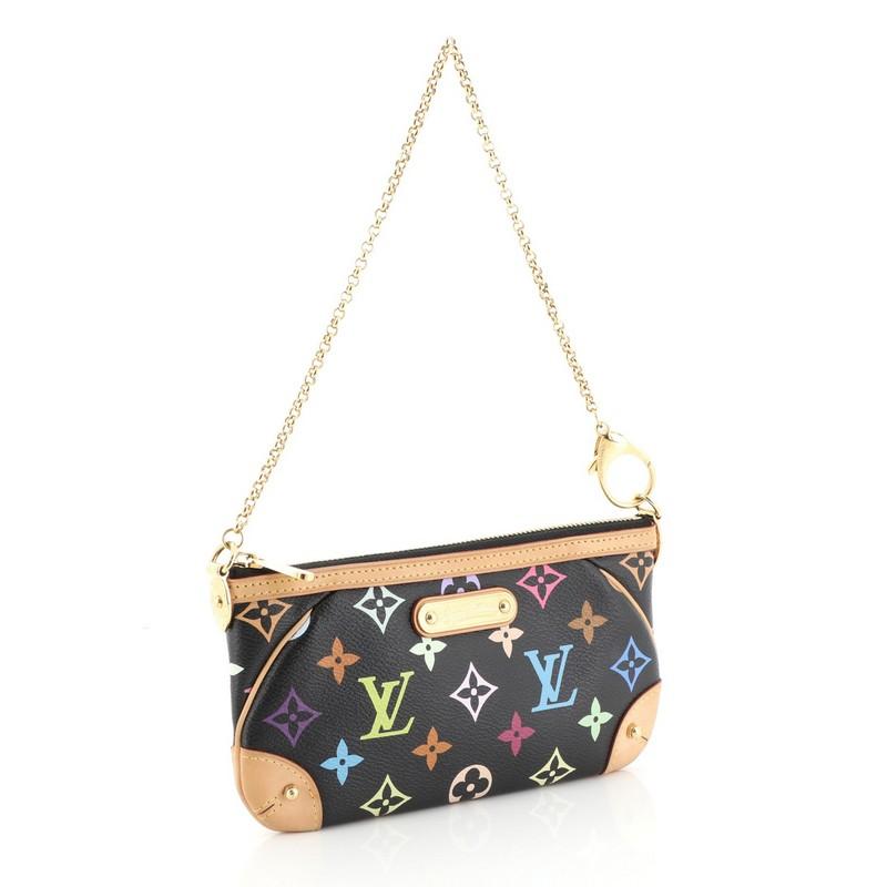 This Louis Vuitton Milla Pochette Monogram Multicolor MM, crafted from black monogram multicolor coated canvas, features natural vachetta leather trim, short chain strap and gold-tone hardware. Its zip closure opens to a neutral microfiber interior