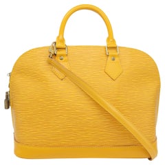 Sac à main à poignée Alma PM en cuir jaune Mimosa de Louis Vuitton, 1996.