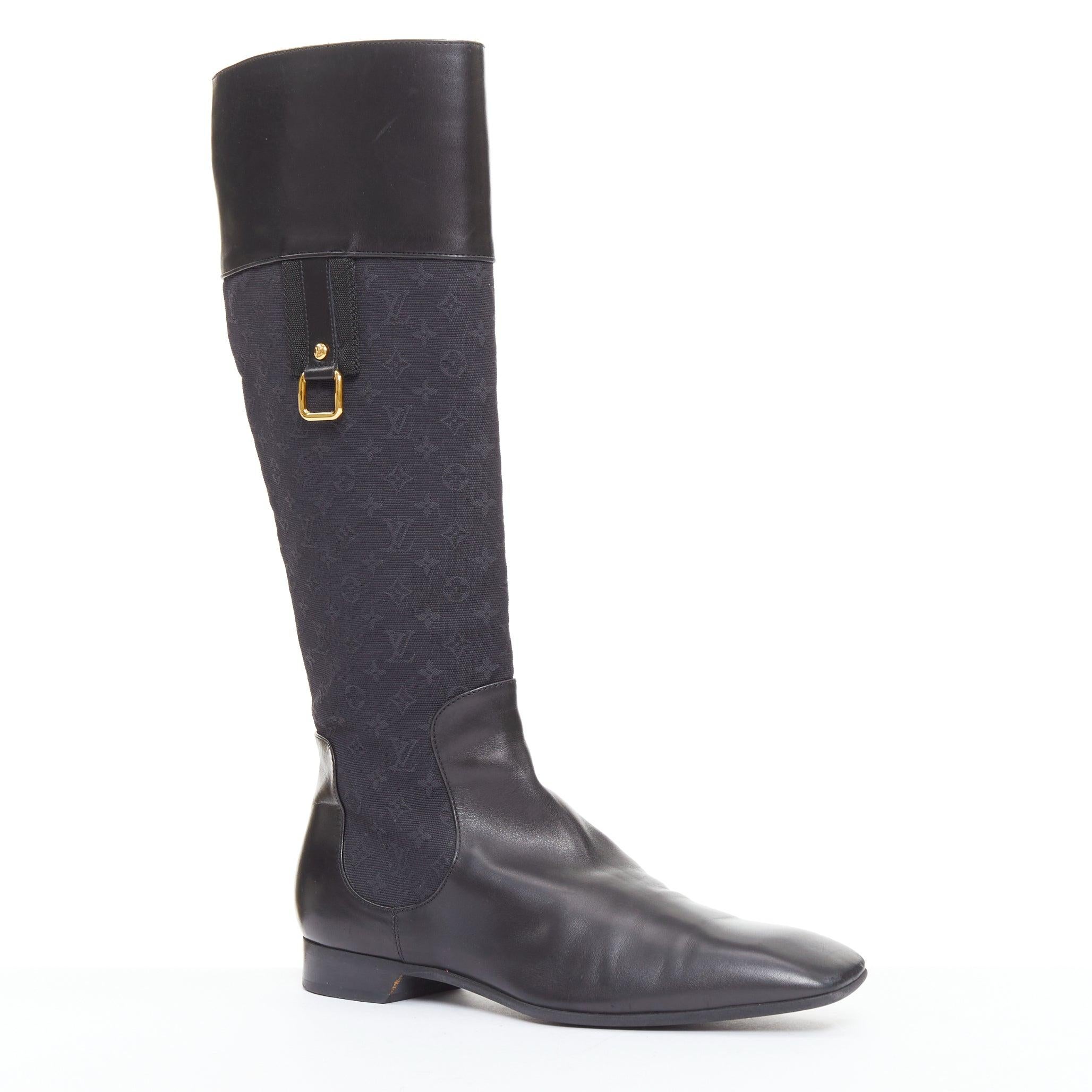 LOUIS VUITTON Mini Lin negro monograma lona saure puntera botas de montar EU37.5
Referencia: TGAS/F00305
Marca: Louis Vuitton
Colección: 2004
Material: Lona, cuero
Color: Negro
Patrón: Monograma
Cierre: Slip On
Forro: Piel negra
Detalles