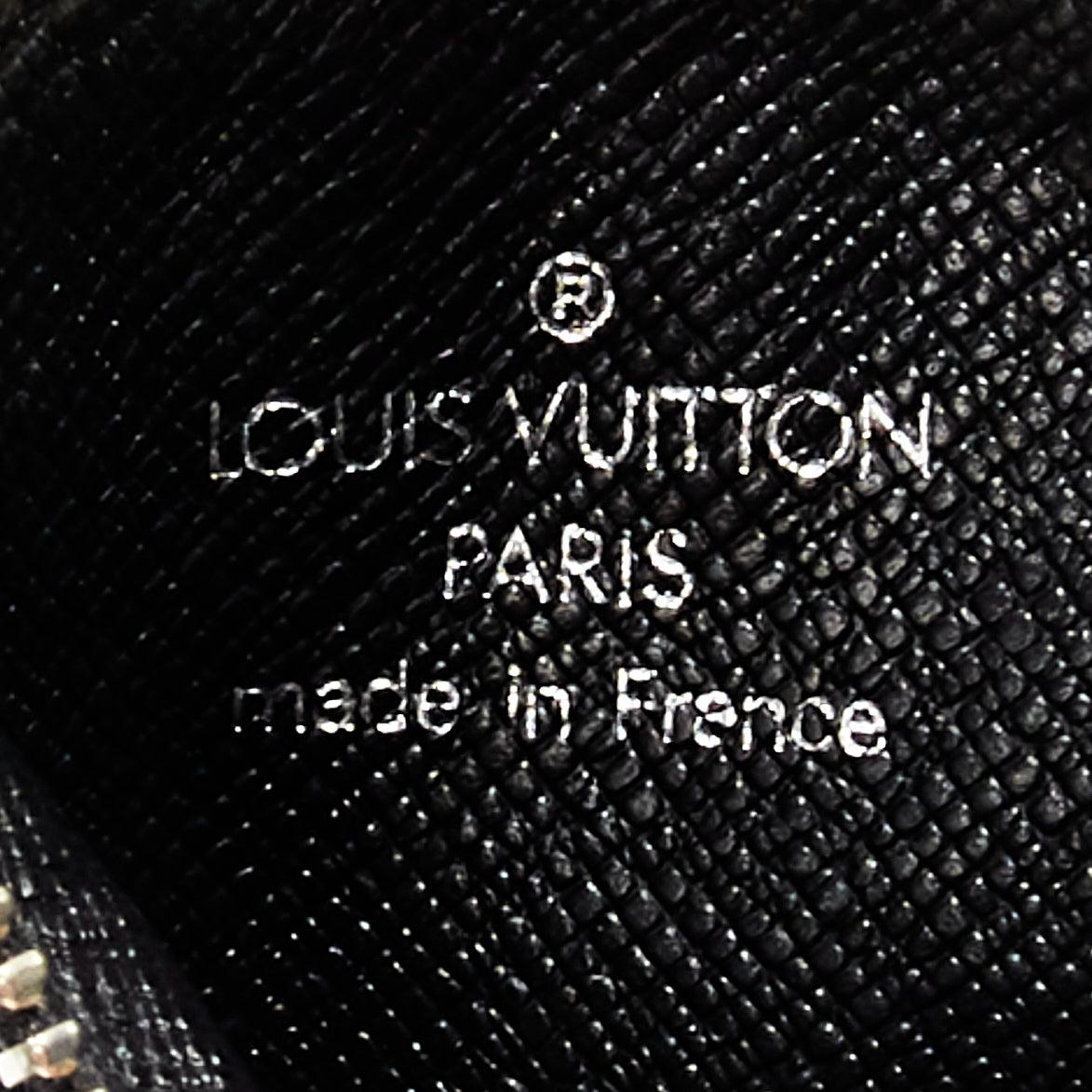 LOUIS VUITTON Mini Monogram Conte de Fees Borsa portamonete con cerchio monogram Apple in vendita 1