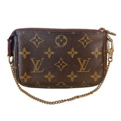Louis Vuitton - Mini pochette Unica