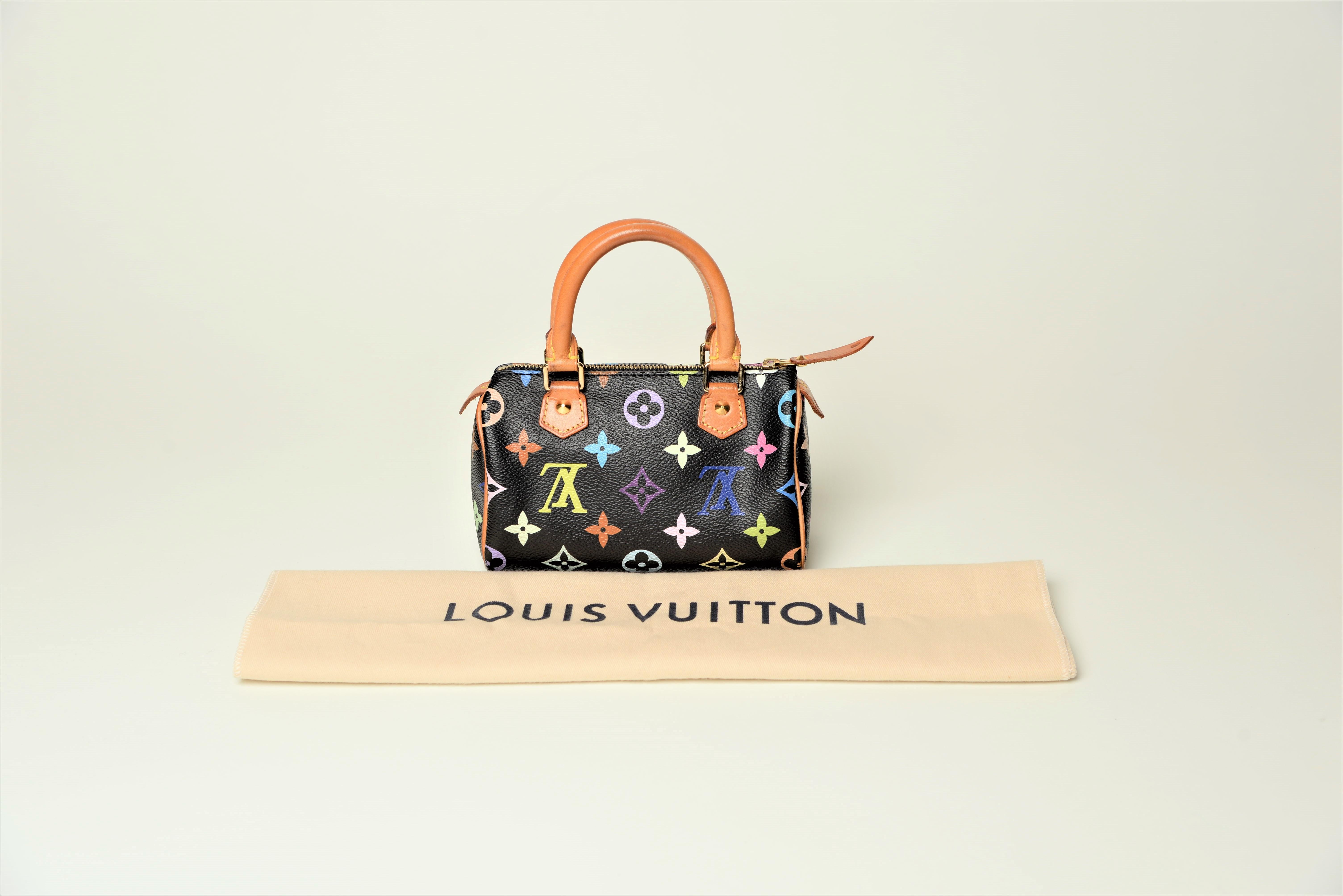 From the collection of SAVINETI we offer this rare Louis Vuitton Mini Speedy Multicolor:
-	Brand: Louis Vuitton
-	Model: Mini Speedy Multicolor (Limited Edition Murakami Collection)
-       Year: 2003 
-       Code: TH0093
-	Condition: