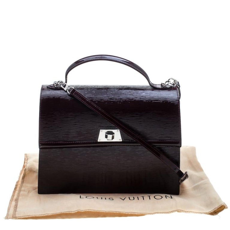 Louis Vuitton Black EPI Electric Sevigne Clutch with Strap at 1stDibs  louis  vuitton clutch with strap, louis vuitton sevigne, black louis vuitton purse  strap