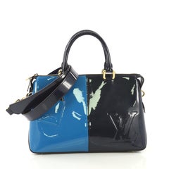Louis Vuitton Miroir Handbag Patent, crafted in blue patent leather