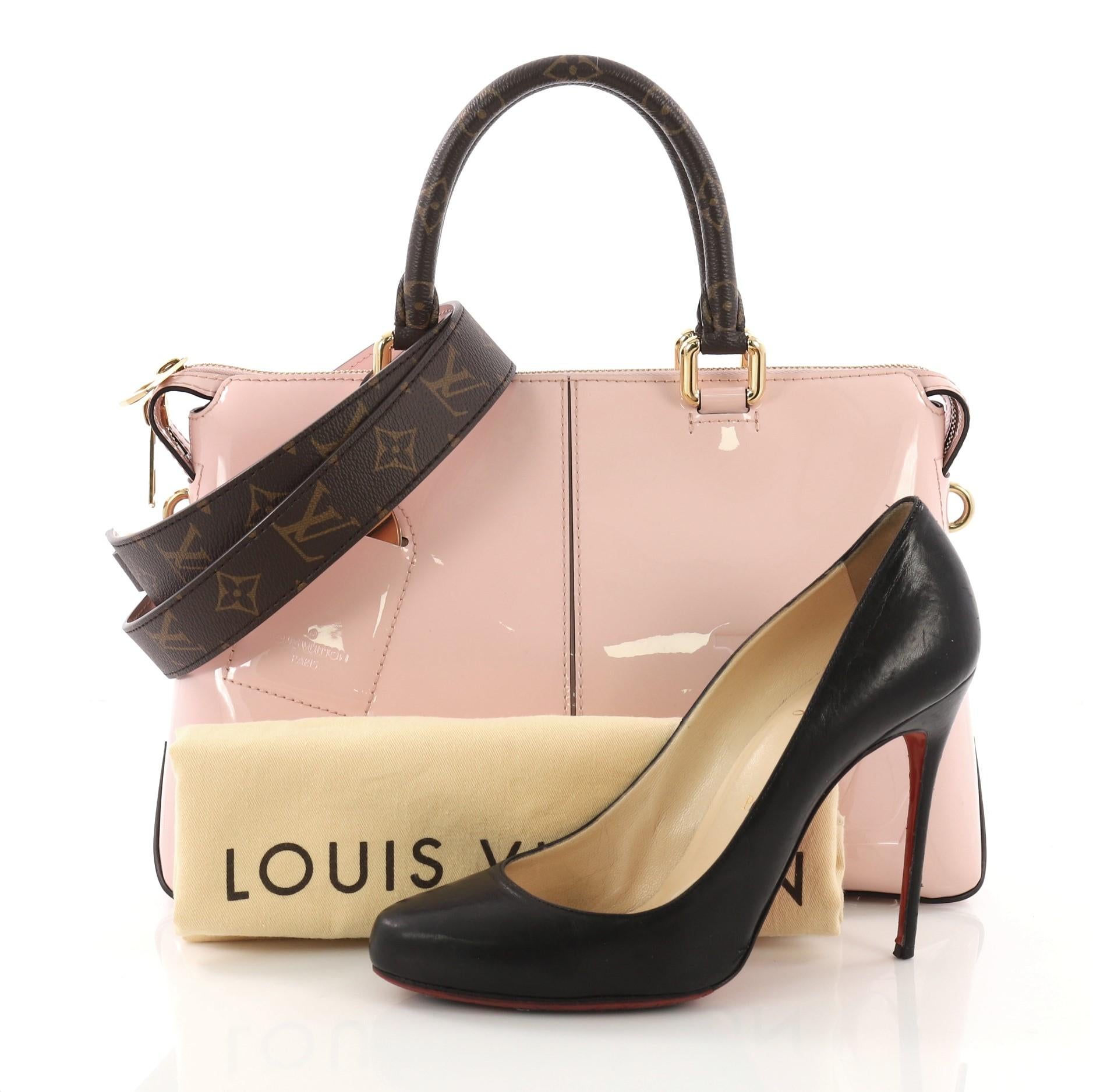 This Louis Vuitton Miroir Handbag Vernis with Monogram Canvas, crafted in pink vernis patent leather, features dual rolled monogram handles and strap, and gold-tone hardware. Its zip closure opens to a pink fabric interior with slip pockets.