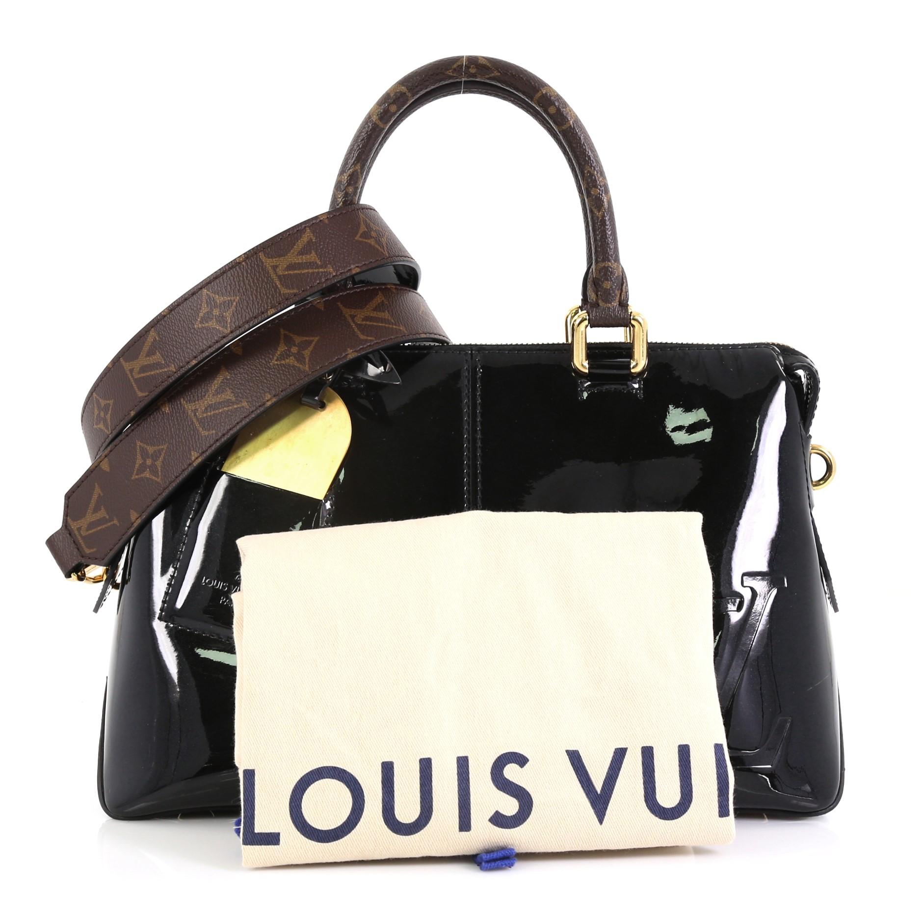 This Louis Vuitton Miroir Handbag Vernis with Monogram Canvas, crafted in black monogram vernis, features dual rolled monogram handles and gold-tone hardware. Its zip closure opens to a black fabric and brown monogram coated canvas interior with