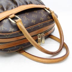 Louis Vuitton Mizi Monogram 866533 Brown Coated Canvas Satchel