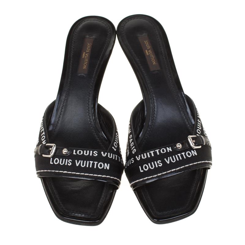 These sandals from Louis Vuitton are a must-have in every woman's footwear collection. These canvas shoes with patent leather trims will make you look confident and elegant at the same time. Lined with strong and durable leather, these are perfect