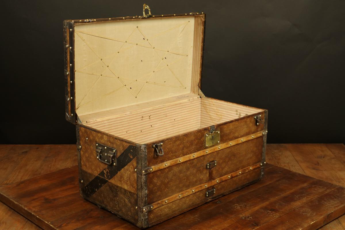 Louis Vuitton monogram woven canvas steamer trunk
Woven canvas
Brass lock
Original inside,
circa 1901-1914.