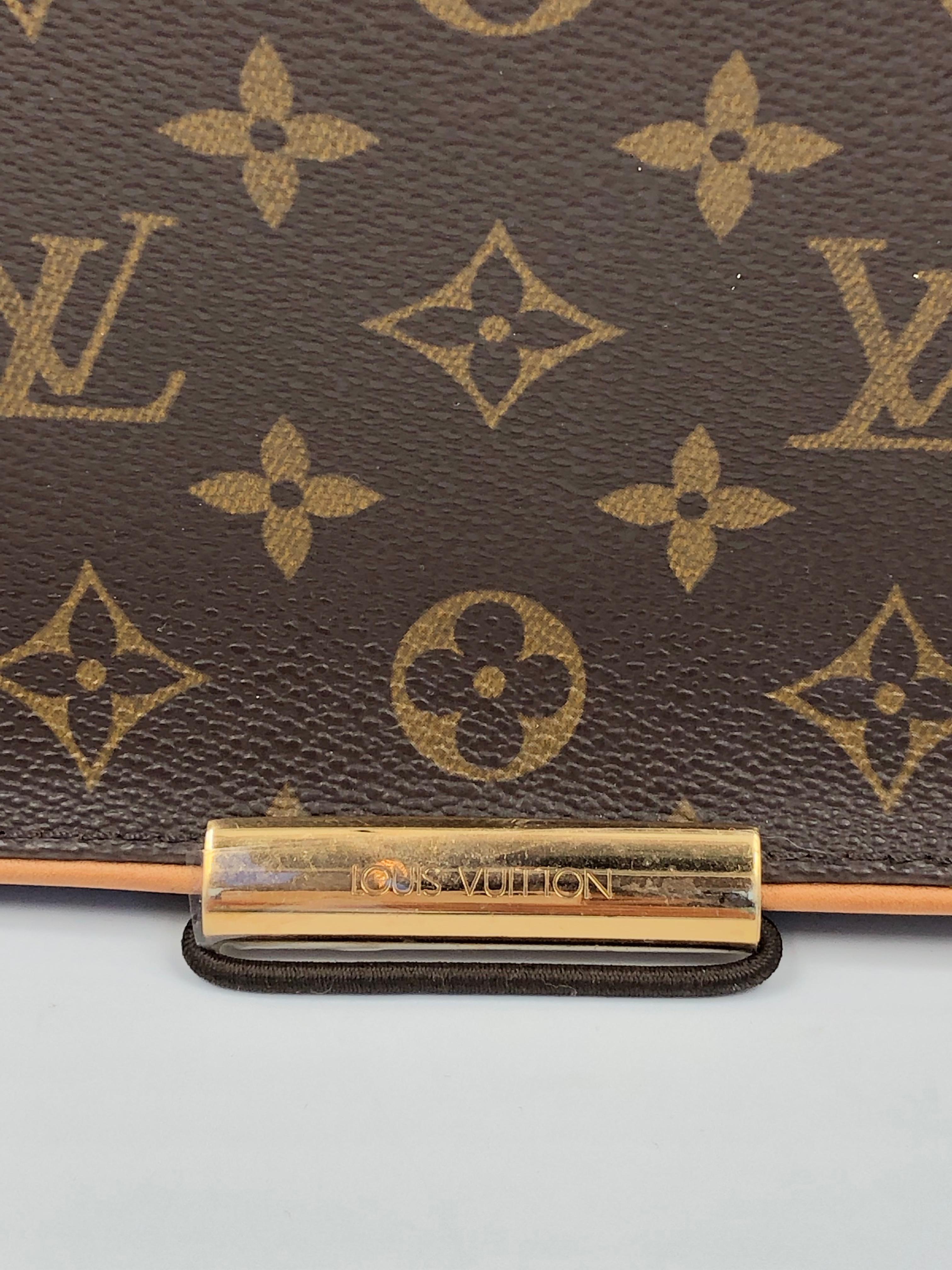 Louis Vuitton Abbesses messenger crossbody bag with brass hardware, tan leather trim and a single adjustable flat shoulder strap. Bag also has a logo adornment at front, dual slit pockets under front flap and a single slit pocket at back. Brown