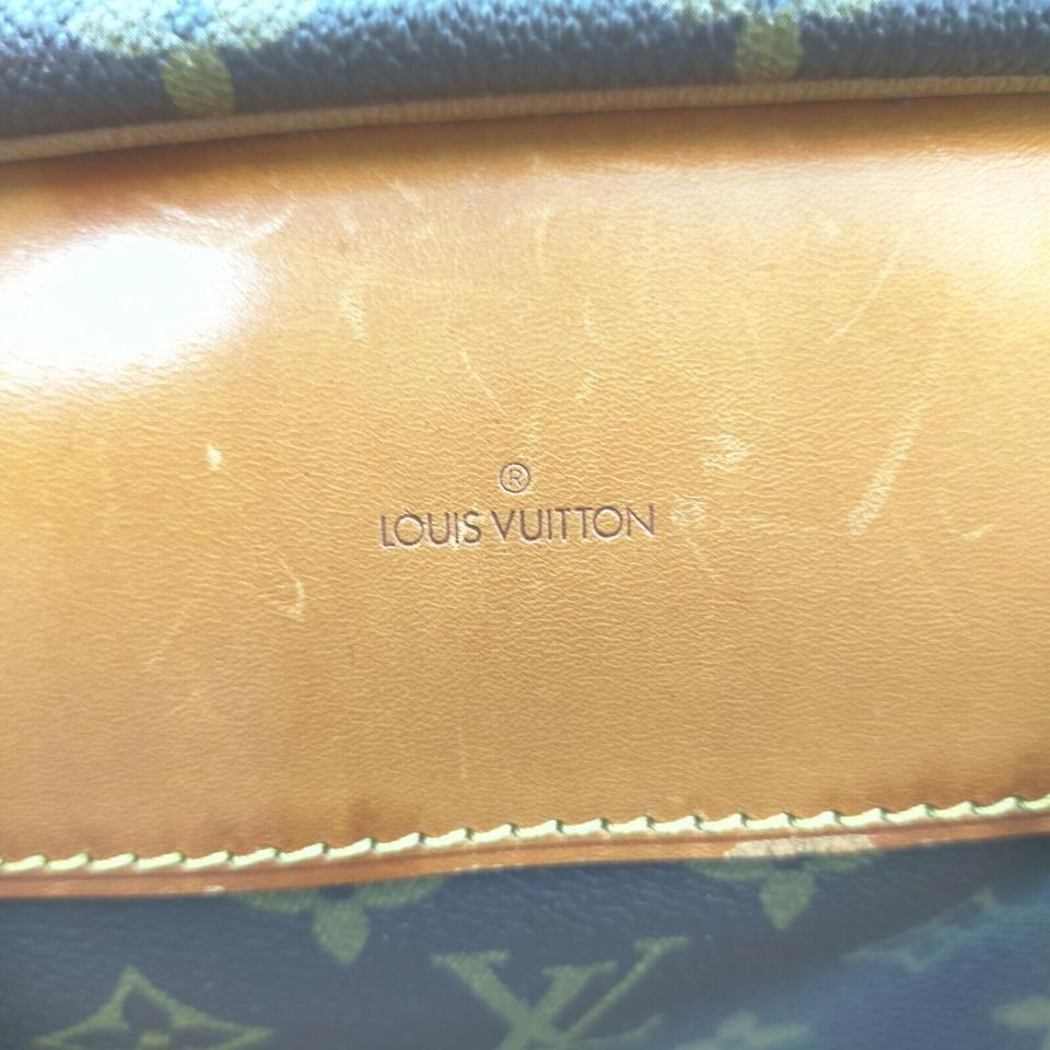 Louis Vuitton - Sac de voyage Alize 1 Poche avec monogramme 861312 Bon état - En vente à Dix hills, NY