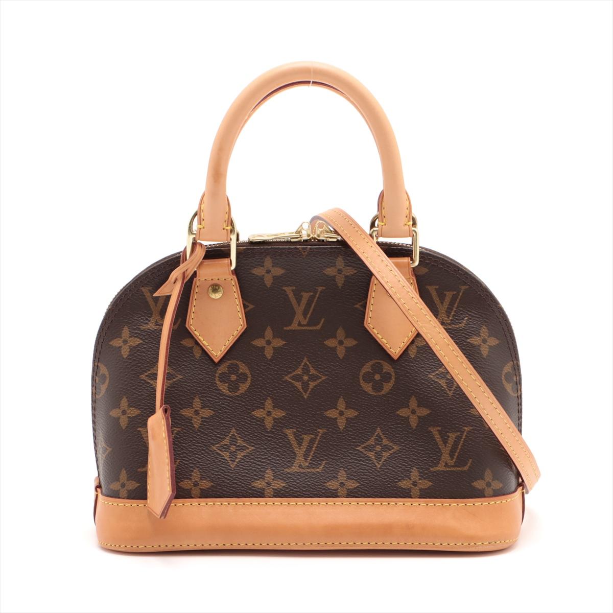 The Louis Vuitton Monogram Alma BB is an exquisite handbag that embodies the epitome of luxury and timeless style. Crafted from the brand's iconic Monogram canvas, its warm brown hue features the renowned LV monogram pattern, showcasing a signature