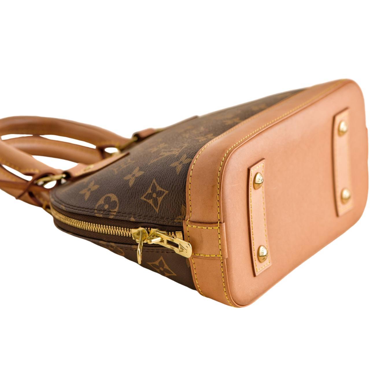 Women's or Men's Louis Vuitton Monogram Alma BB Satchel Bag For Sale