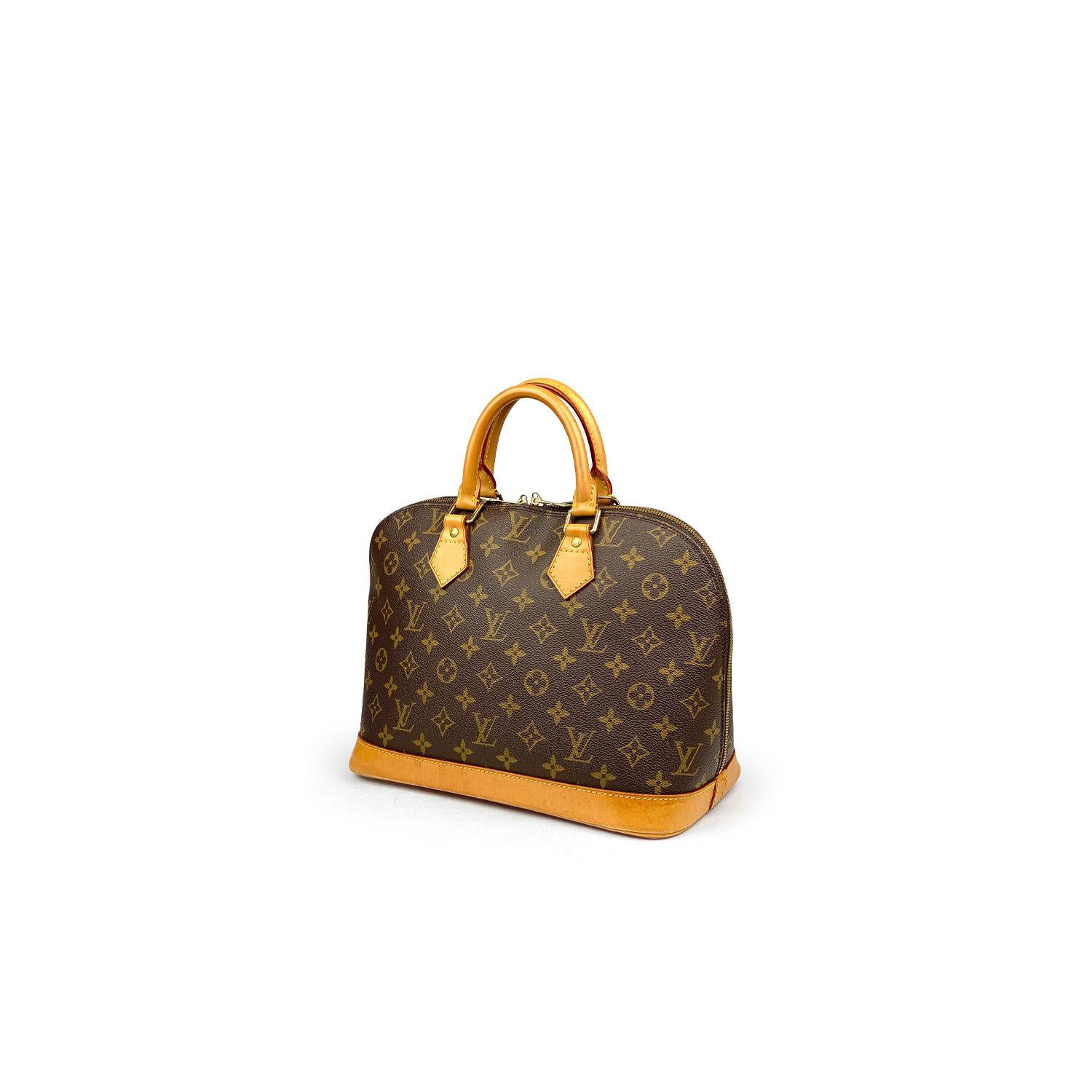 Brown and tan monogram coated canvas Louis Vuitton Alma PM with

– Brass hardware
– Tan vachetta leather trim
– Dual rolled top handles
– Brown canvas lining
– Single slip pocket at interior and two-way zip closure at top

Overall Preloved