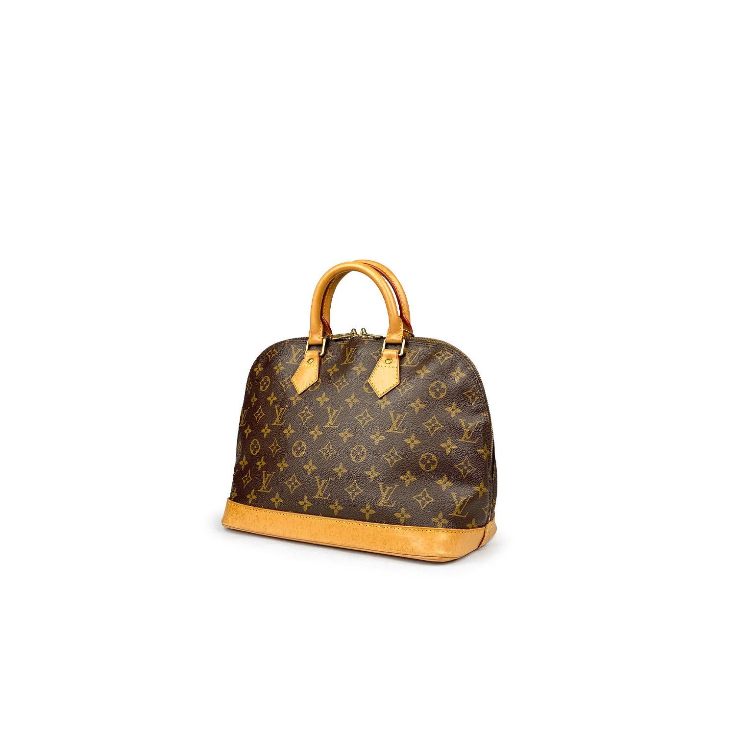 Brown and tan monogram coated canvas Louis Vuitton Alma PM with

– Brass hardware
– Tan vachetta leather trim
– Dual rolled top handles
– Brown canvas lining
– Single slip pocket at interior and two-way zip closure at top

Overall Preloved