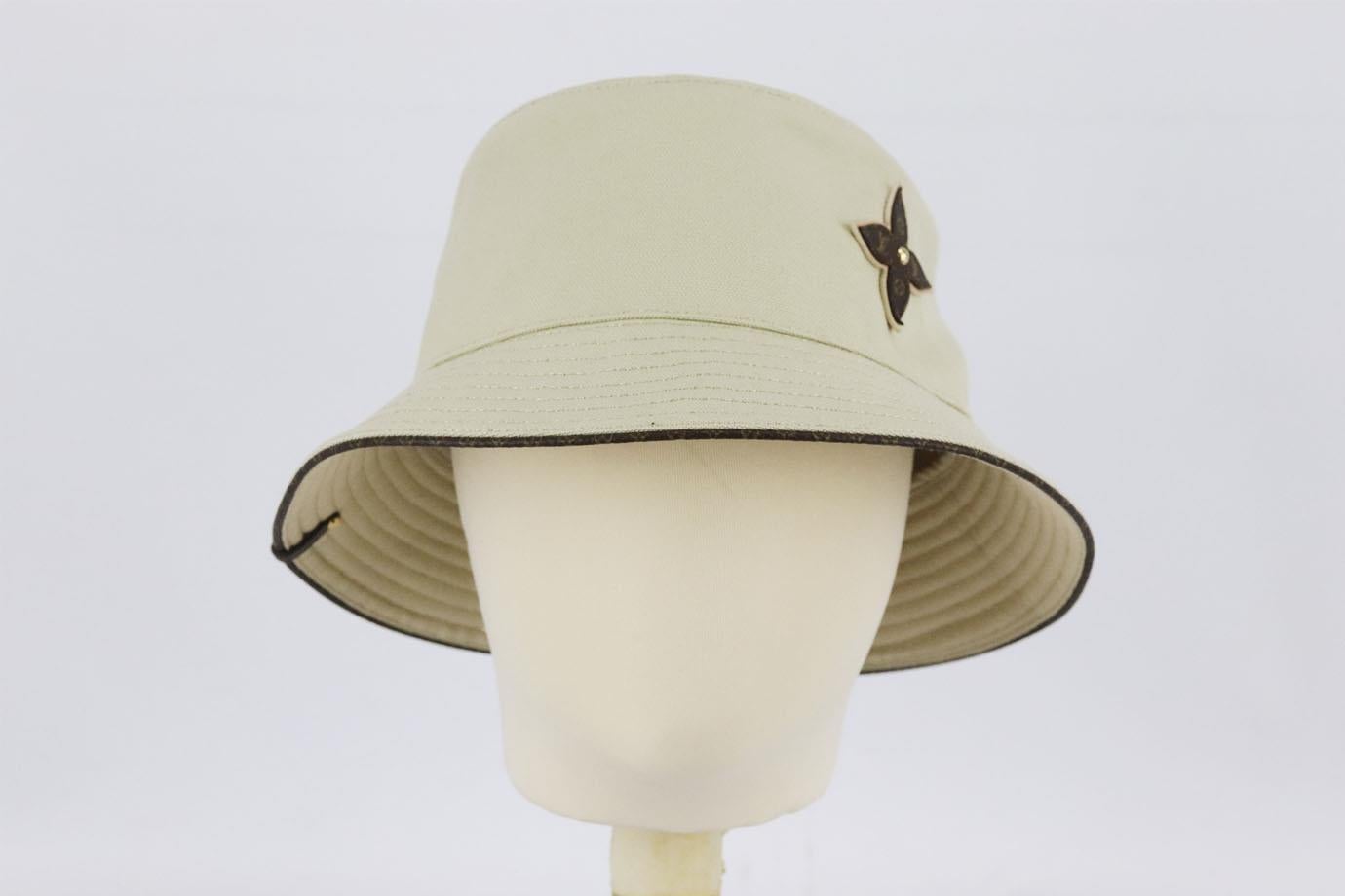 Louis Vuitton monogram appliquéd cotton canvas bucket hat. Beige. Slips on. Does not come with dustbag or box. 100% Cotton; coating: 100% polyester. Size: Small (56 cm). Brim Width:  2.2 in  Very good condition - As new condition, no sign of wear;