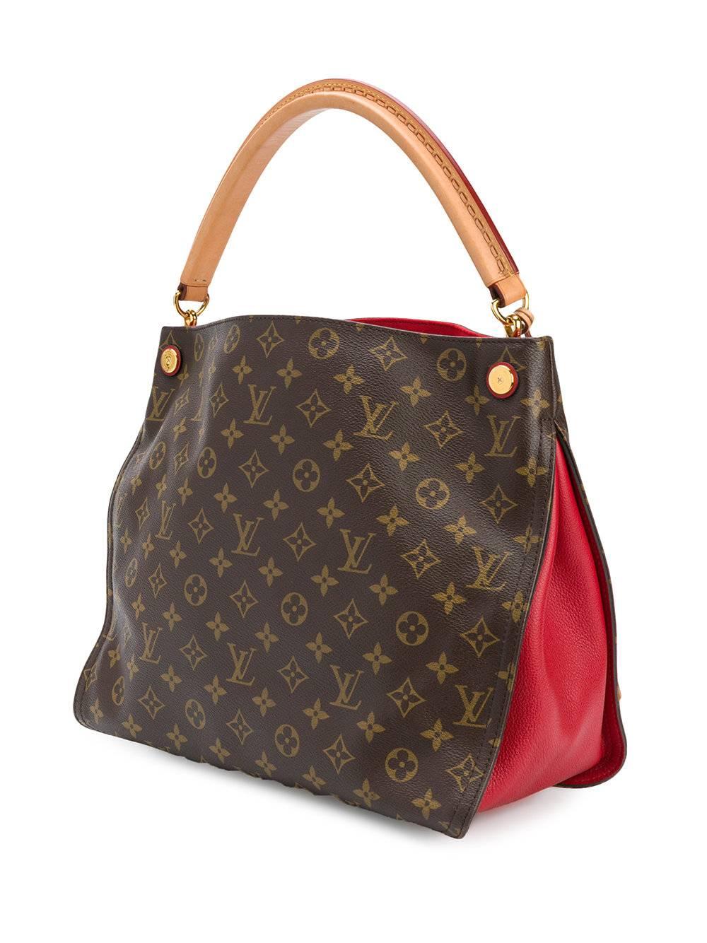 This brown, beige and red leather monogram oversized tote from Louis Vuitton Vintage featuring a round top handle, a main internal compartment, an internal logo patch, an internal slip pocket, a monogram pattern, gold-tone hardware, hanging padlock
