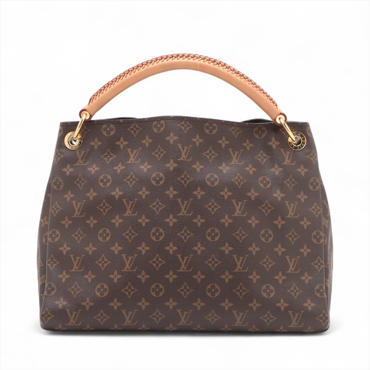 The Louis Vuitton Monogram Artsy MM is a timeless and sophisticated handbag that exudes elegance and style. With its distinctive Monogram pattern and spacious design, the bag seamlessly blends fashion and functionality. The bag features Louis