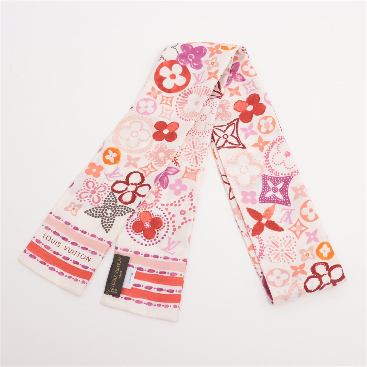 The Louis Vuitton Monogram Bandeau Multicolor Peach is a vibrant and stylish accessory that adds a touch of elegance to any outfit. Crafted from luxurious silk, it features the iconic Louis Vuitton monogram pattern in a delicate peach-toned