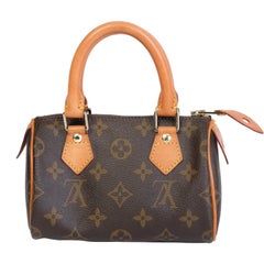 Louis Vuitton Monogram Bandouliere Nano Speedy Mini Handbag