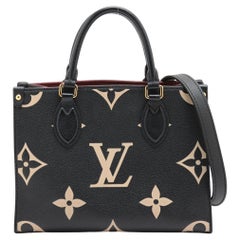Louis Vuitton Monogram Bicolor Empreinte On the Go PM Schwarz x Beige Monogramm Empreinte
