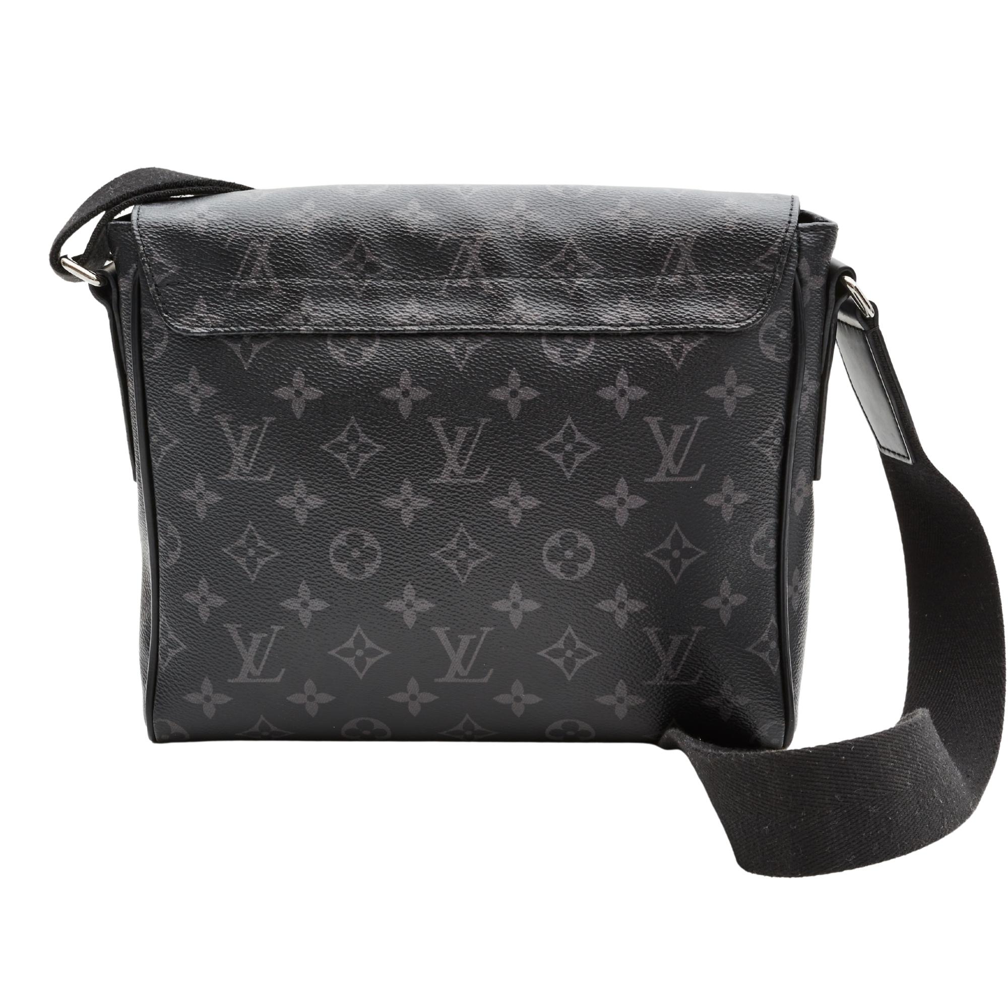 This bag is made with monogram print on toile canvas in graphite with black piping trim. The bag features an adjustable black crossbody strap, polished silver hardware, a front flap with a black Louis Vuitton LV logo and the bag opens to a black