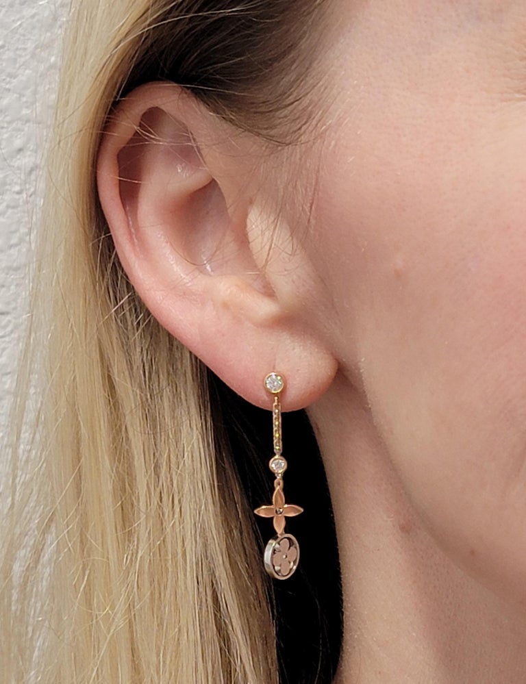 LV' earrings