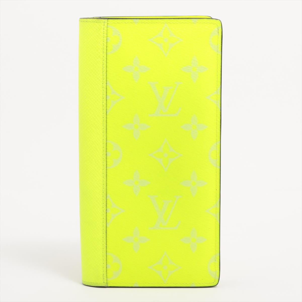 The Louis Vuitton Monogram Brazza Bi-fold Long Wallet in Yellow is a vibrant and luxurious accessory that combines style with practicality. Crafted from the iconic Monogram canvas, the wallet features Louis Vuitton's signature monogram pattern,
