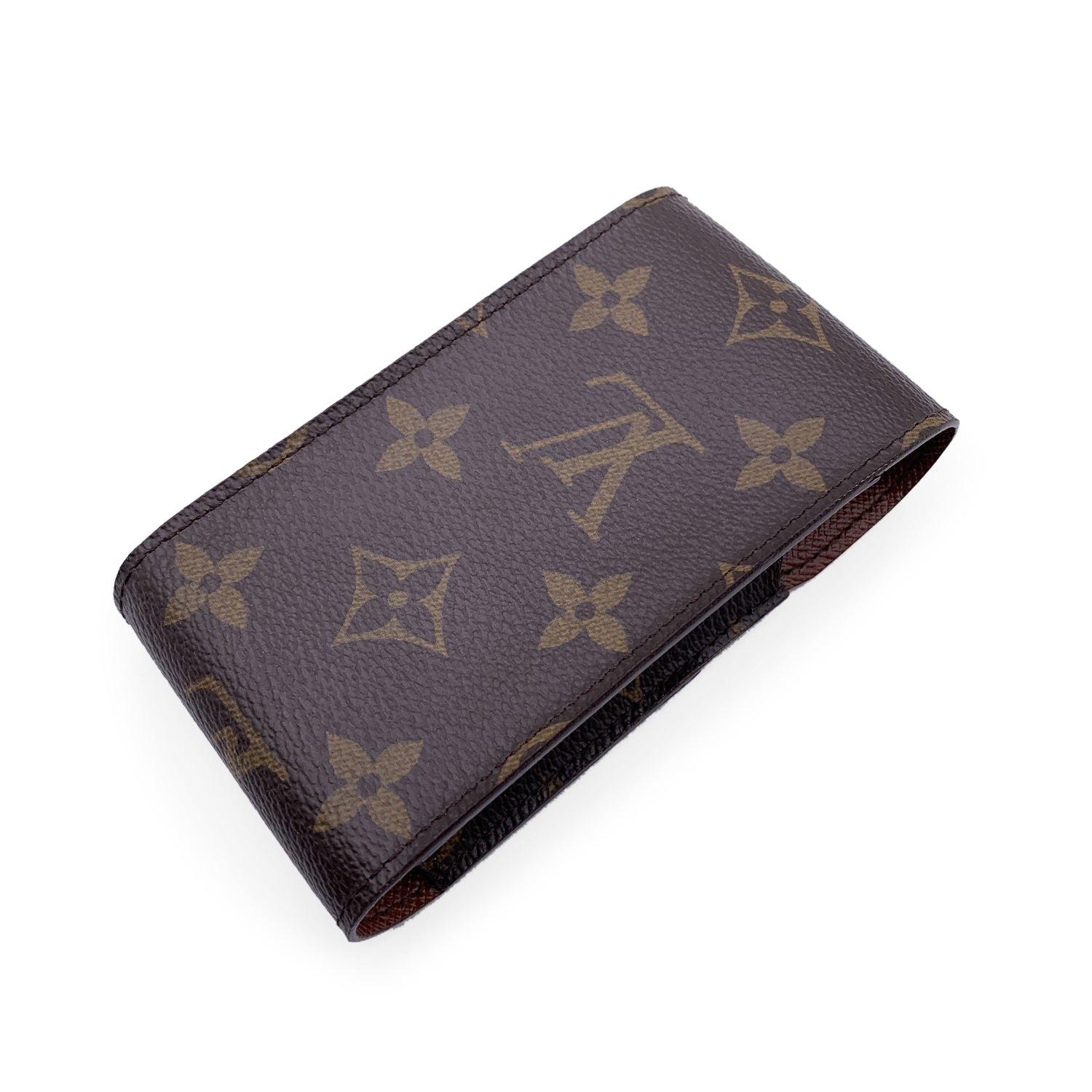 This cigarette case by LOUIS VUITTON is a discreet and practical accessory. The flap of this cigarette case in Monogram canvas slips securely into the base to form a pouch to hold cigarette or bills or to create an elegant holder for whatever you