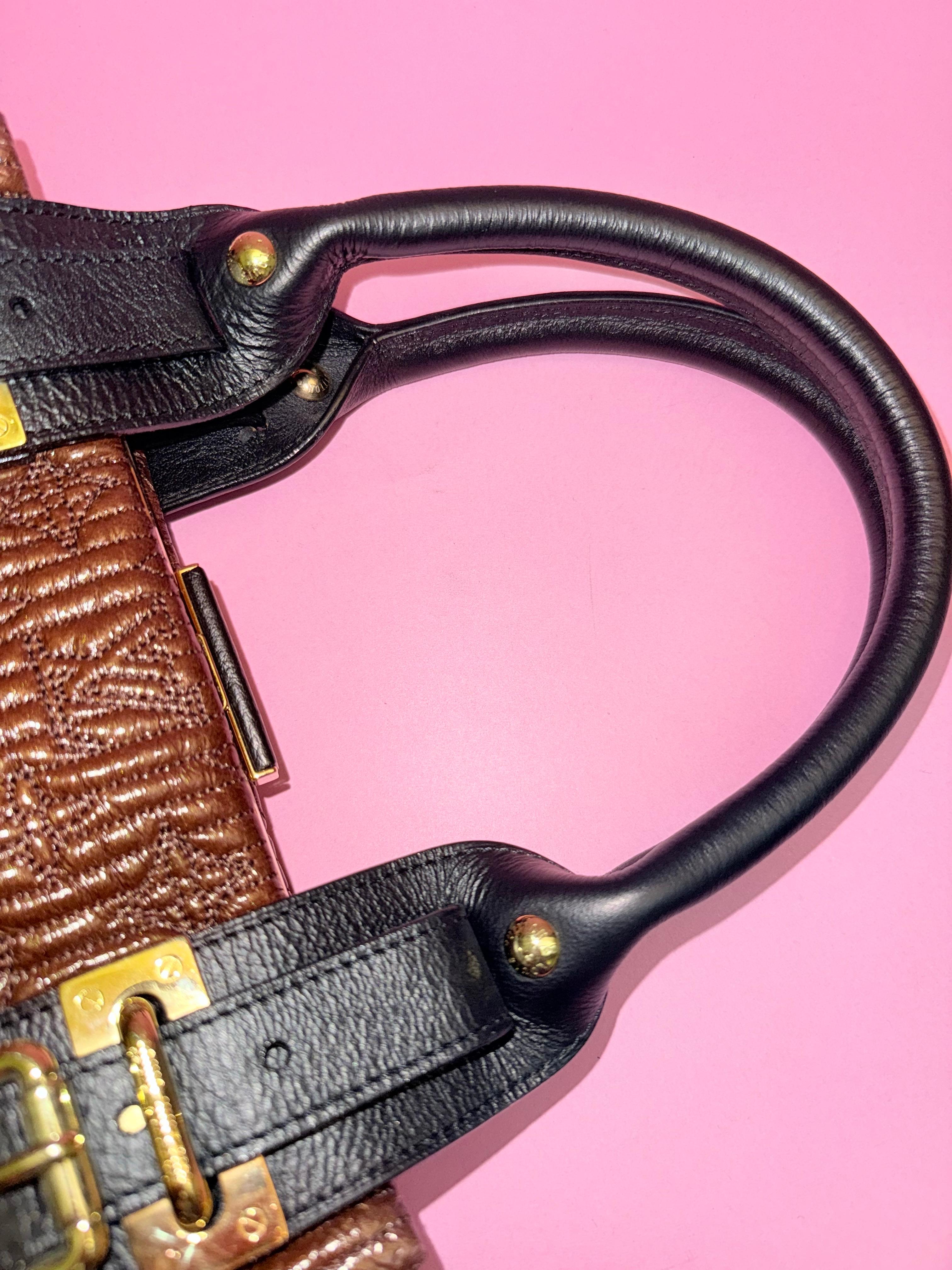 Bolso motero Louis Vuitton Monograma Marrón Motard en venta 1