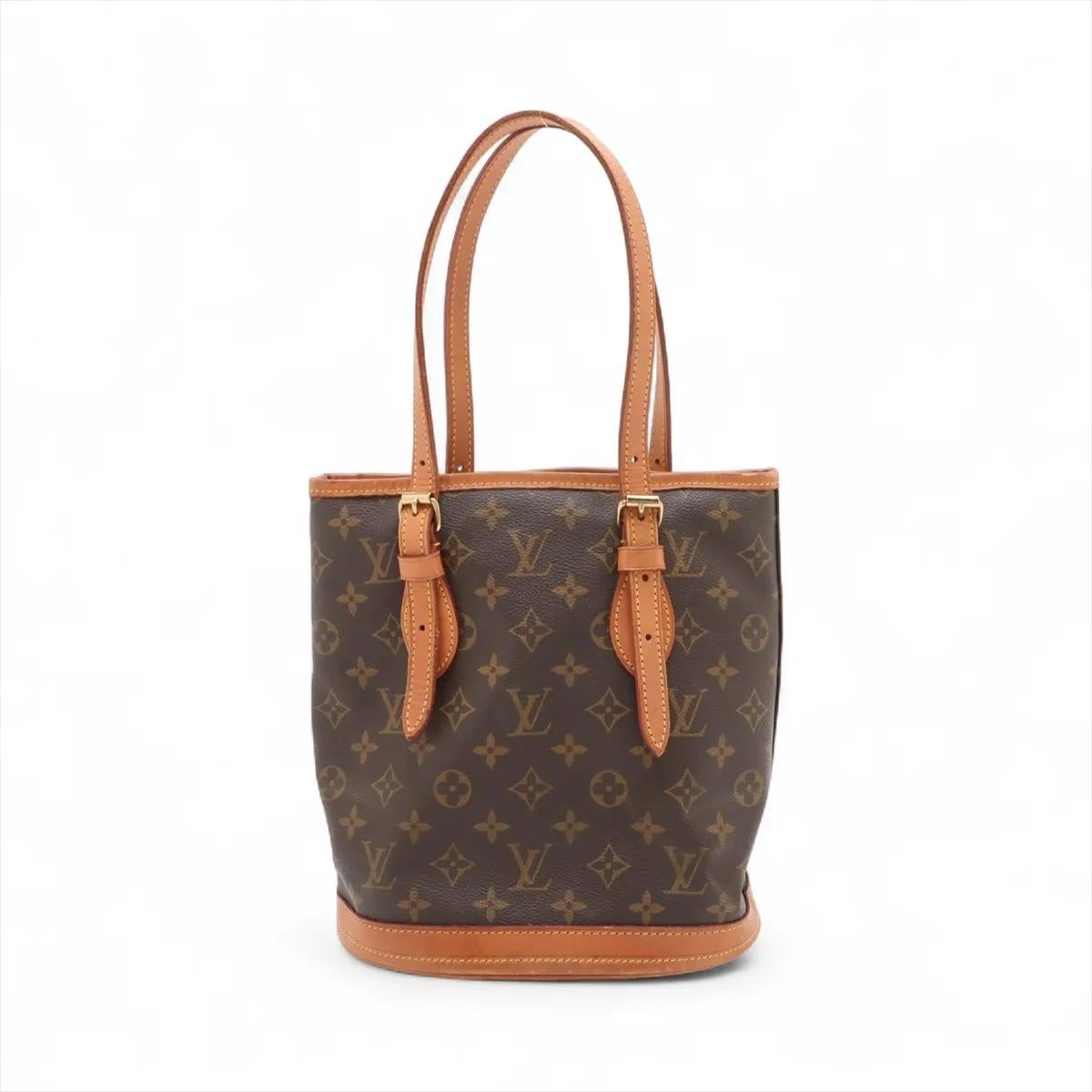 The Louis Vuitton Monogram Bucket PM Tote Bag is a classic and versatile piece crafted from the house’s iconic Monogram canvas with natural leather trim. Designed with a timeless bucket silhouette, it offers both elegance and practicality for