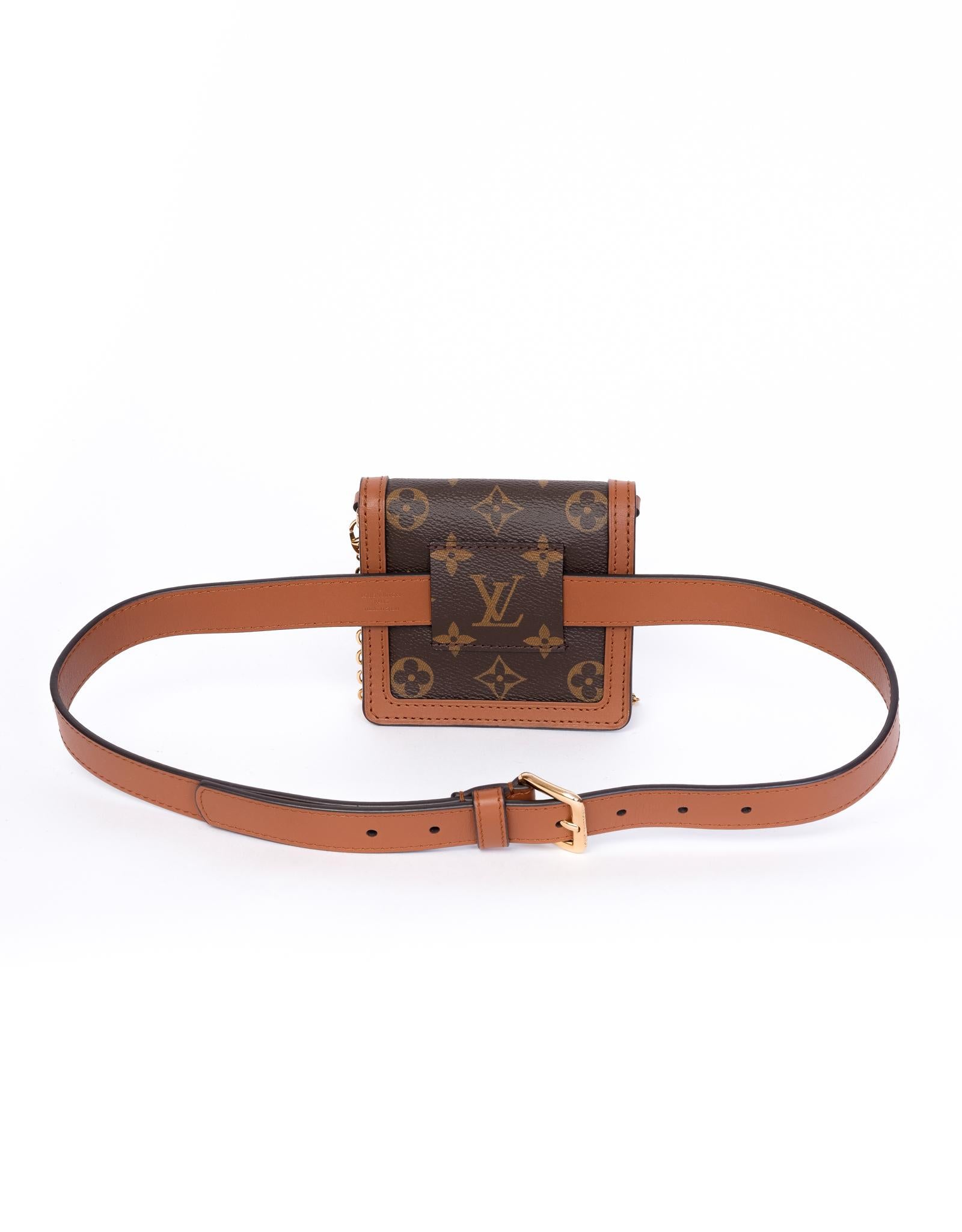 The Bumbag Dauphine BB is a tiny belt-pouch made of Monogram and Monogram Reverse coated canvas with calf-leather trim. Featuring gold tone hardware, Dauphine signature lock on front flap, alcantara interior with zip pocket and card slot. It can