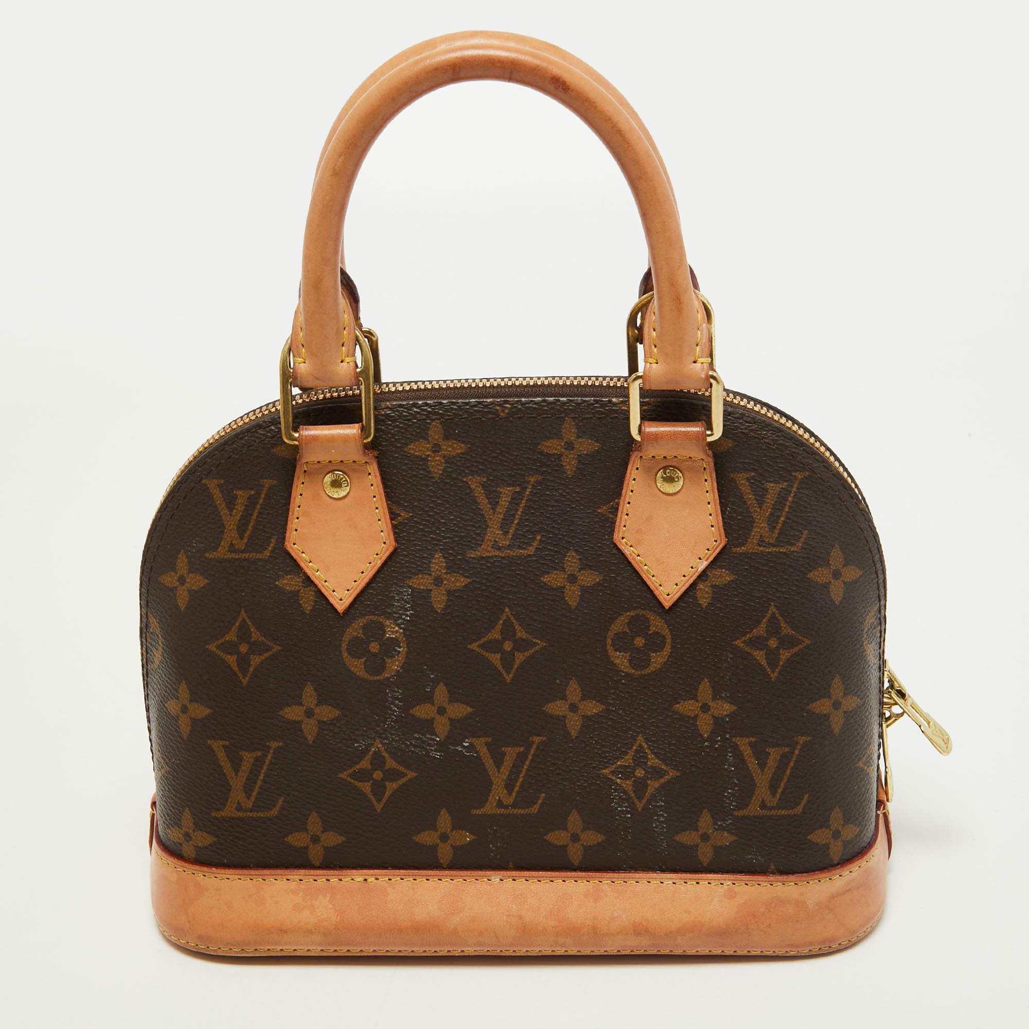 The LV Alma is a classic that has received love from icons. This piece comes crafted from Monogram canvas and leather, featuring double zippers with a padlock and a canvas interior. Two rolled handles, and a shoulder strap are provided for you to