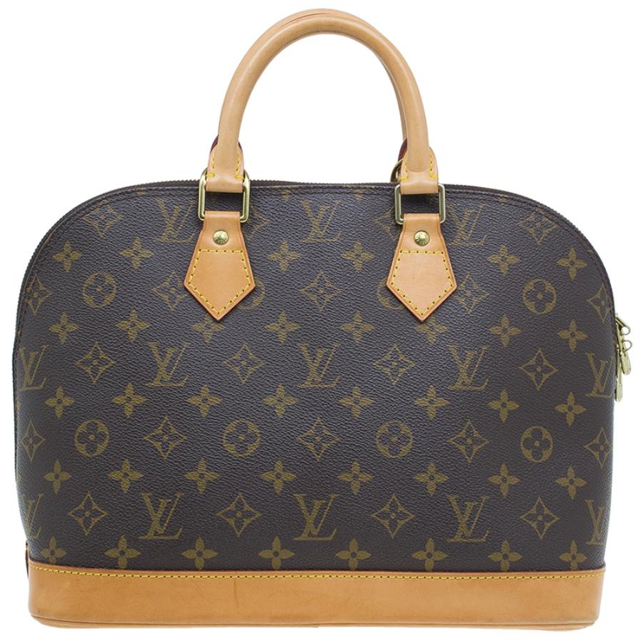 You can never go wrong with the Alma bag by Louis Vuitton. This beautiful monogram canvas satchel features a sophisticated tan leather trim, with rolled double top handles, and a base for a stylish and elegant finish. The all-around double zip