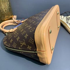 Louis Vuitton Monogram Canvas Alma Top Handle Bag with Honey Patina
