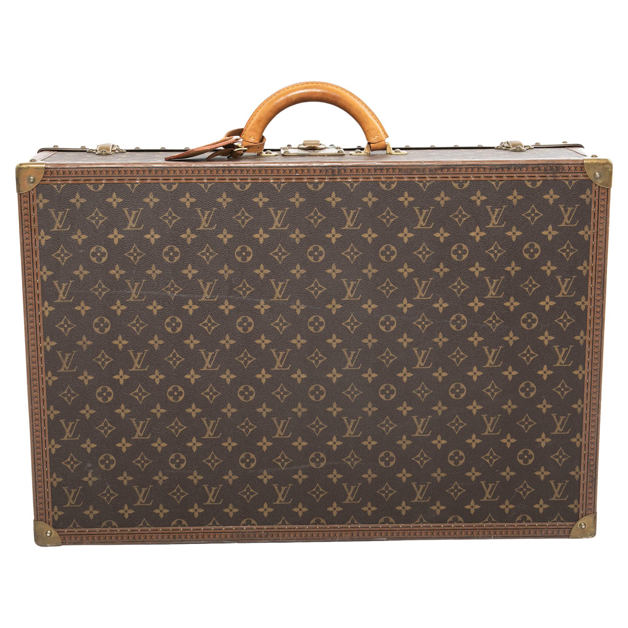 At Auction: LOUIS VUITTON suitcase ALZER 65