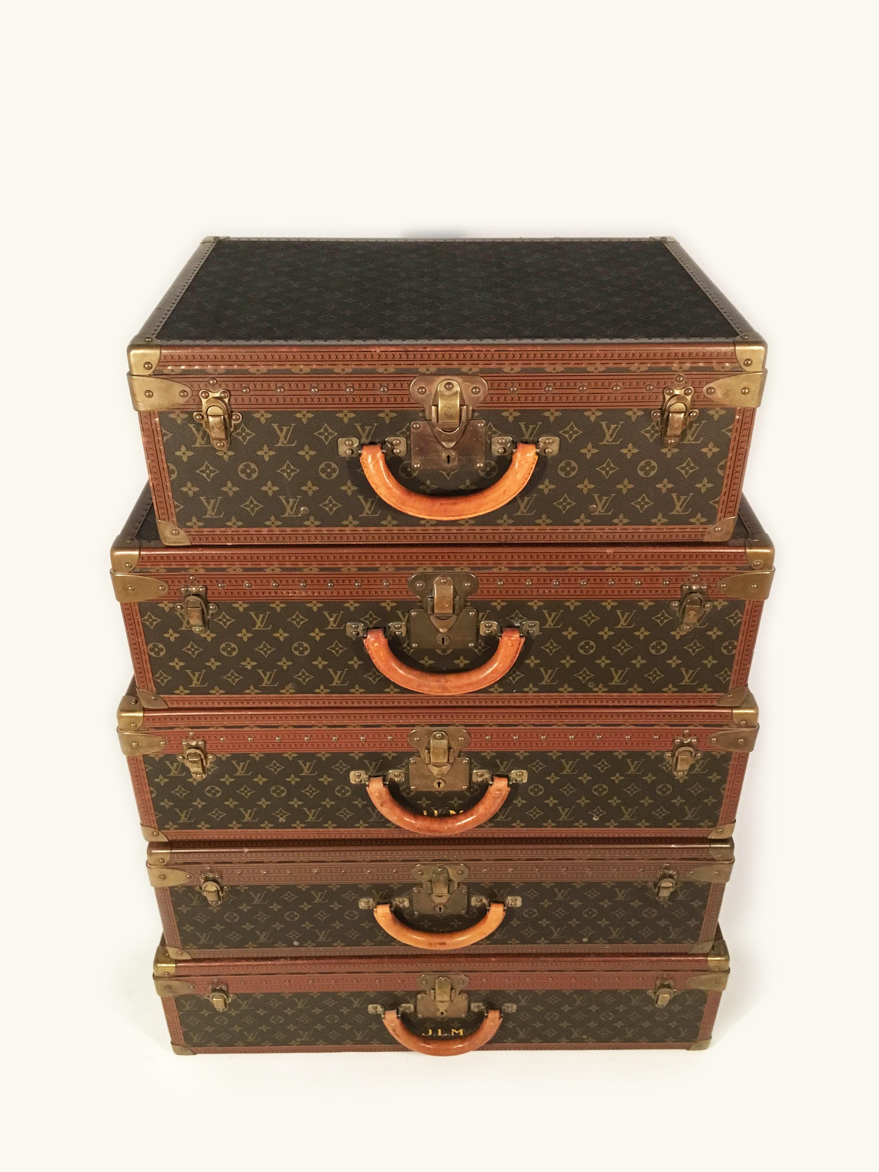 A Louis Vuitton Alzer five-piece suitcases collection. The 
