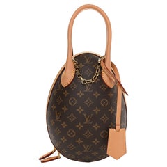 Louis Vuitton EGG bag, Monogram coated & Black leather W/ Box
