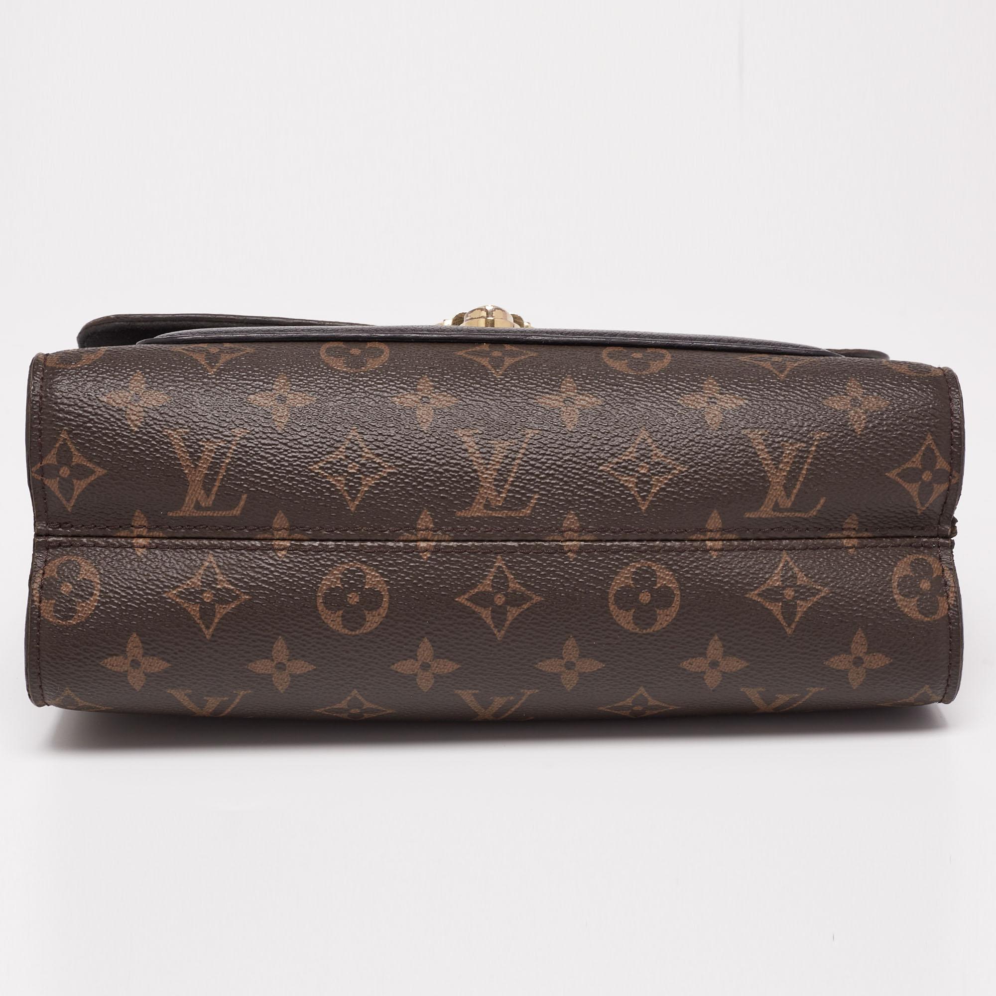 Louis Vuitton Victoire-Tasche aus Segeltuch mit Monogramm und schwarzem Leder im Zustand „Gut“ in Dubai, Al Qouz 2